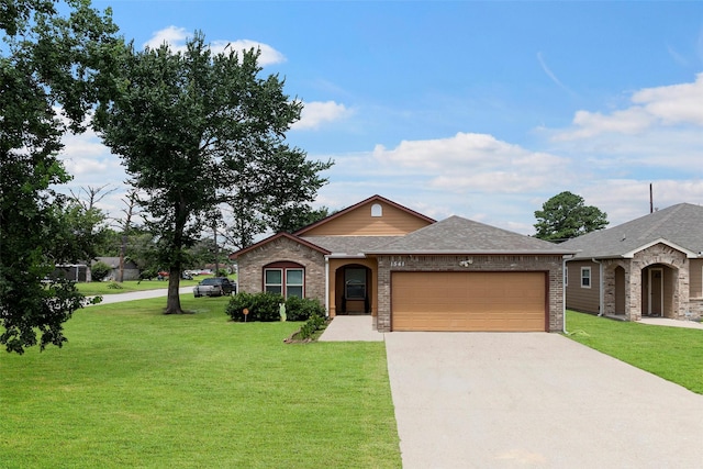 1541 3rd St, Hempstead, TX 77445 - view of front of property featuring an attached garage, driveway, a front yard, and roof with shingles