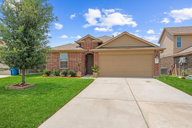 1055 Rancho Grande Dr, Channelview, TX 77530 - view of front of property with brick siding, driveway, a garage, and a front yard