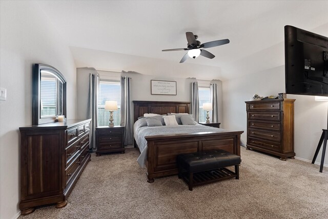 1055 Rancho Grande Dr, Channelview, TX 77530 - bedroom featuring light colored carpet, multiple windows, and ceiling fan