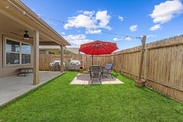 1055 Rancho Grande Dr, Channelview, TX 77530 - fenced backyard featuring a patio and a ceiling fan