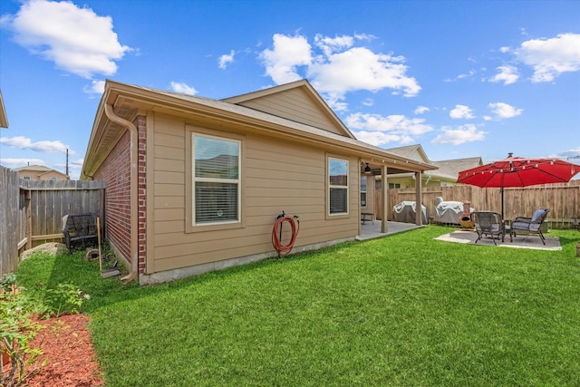 1055 Rancho Grande Dr, Channelview, TX 77530 - rear view of house featuring a patio and a fenced backyard