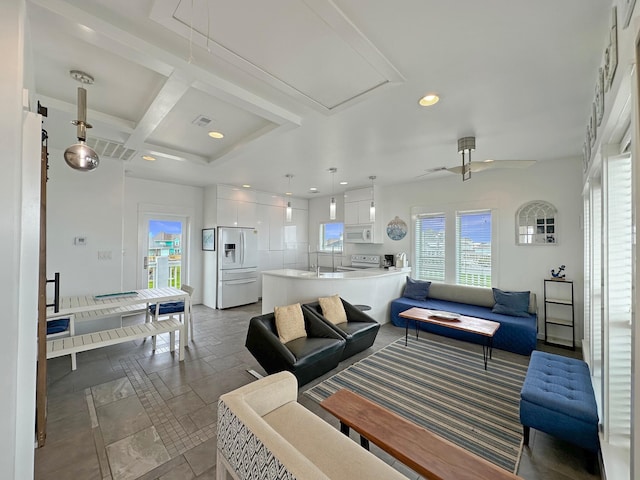 2496 Gilmore, Crystal Beach, TX 77650 - living area with attic access, coffered ceiling, recessed lighting, beamed ceiling, and ceiling fan