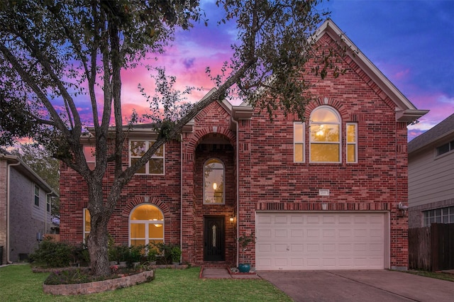 2111 Scenic Hollow Ct, Katy, TX 77450 - view of front facade featuring brick siding, an attached garage, and driveway