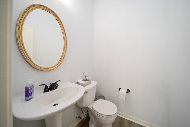 2111 Scenic Hollow Ct, Katy, TX 77450 - bathroom with wood finished floors and a sink