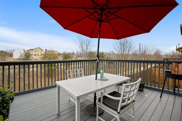 2841 Sherwin St, Houston, TX 77007 - wooden terrace with outdoor dining area