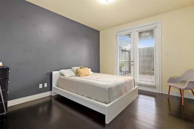 2841 Sherwin St, Houston, TX 77007 - bedroom with access to outside and dark wood-style flooring