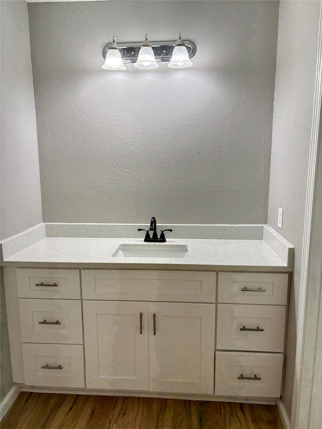 10434 Rocky Hollow Rd, La Porte, TX 77571 - bathroom with wood finished floors and vanity
