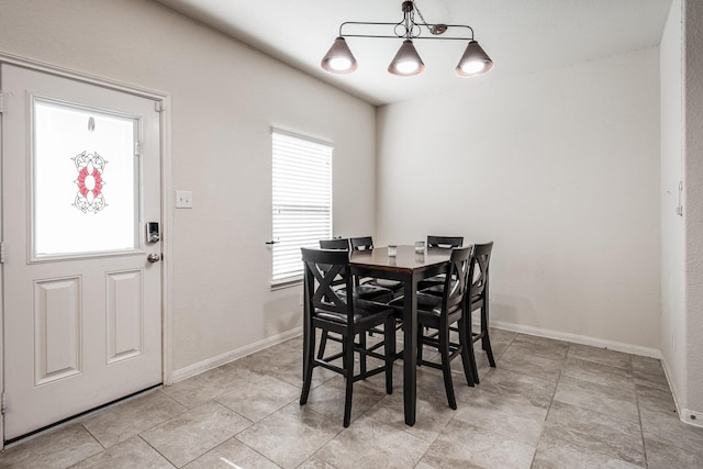901 Jefferson Ave, Cleveland, TX 77327 - dining room with baseboards
