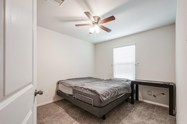 901 Jefferson Ave, Cleveland, TX 77327 - bedroom with carpet flooring and a ceiling fan