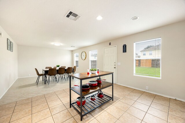 814 Eagles Glide Dr, Houston, TX 77090 - dining area featuring light tile patterned floors and recessed lighting