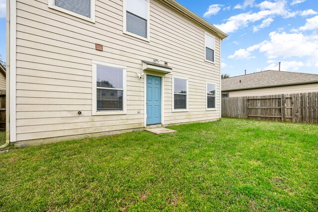 814 Eagles Glide Dr, Houston, TX 77090 - rear view of property with a fenced backyard