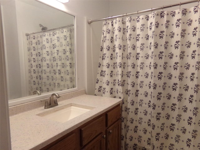 505 S Saint Andrews St, Weimar, TX 78962 - bathroom featuring vanity and a shower with curtain