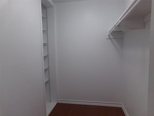 505 S Saint Andrews St, Weimar, TX 78962 - spacious closet with dark wood-style floors