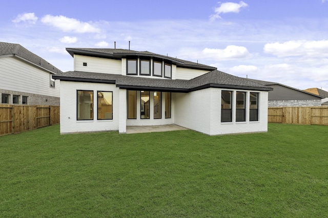 3185 Stingray Cove Dr, Katy, TX 77493 - back of property with roof with shingles, a fenced backyard, and brick siding