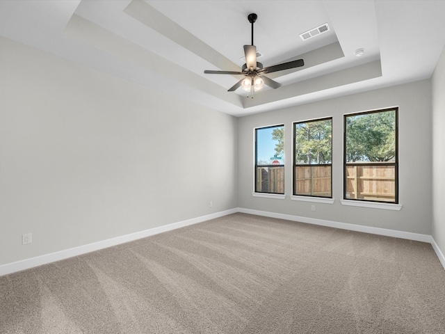 3185 Stingray Cove Dr, Katy, TX 77493 - carpeted spare room featuring a raised ceiling, a ceiling fan, and a smoke detector