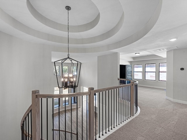 3185 Stingray Cove Dr, Katy, TX 77493 - hallway with an upstairs landing, a chandelier, and carpet floors
