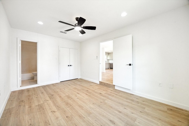 5859 Belmark St, Houston, TX 77033 - unfurnished bedroom featuring light wood-style floors, a closet, ensuite bathroom, recessed lighting, and a ceiling fan