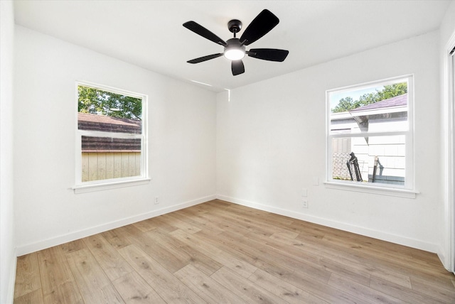 5859 Belmark St, Houston, TX 77033 - spare room featuring light wood-type flooring and a ceiling fan