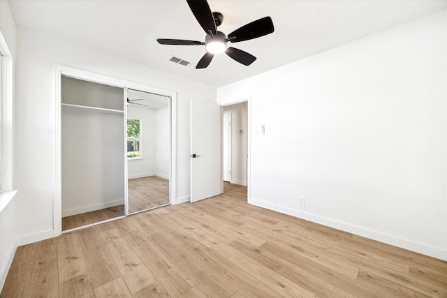 5859 Belmark St, Houston, TX 77033 - unfurnished bedroom with light wood-style flooring, a closet, and a ceiling fan