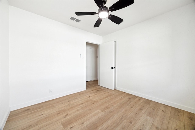 5859 Belmark St, Houston, TX 77033 - spare room featuring light wood-type flooring and ceiling fan