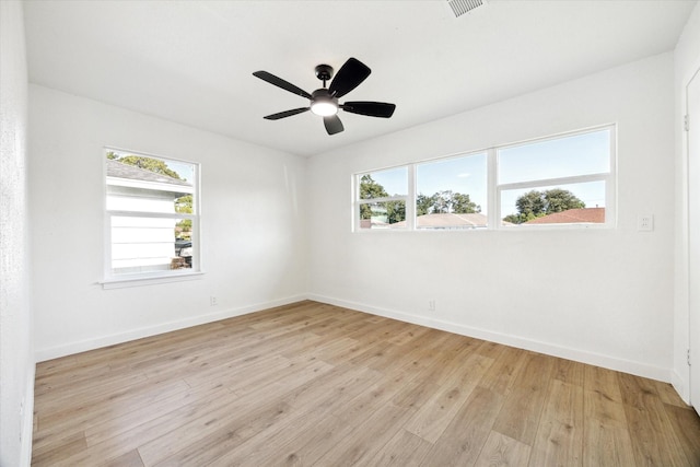 5859 Belmark St, Houston, TX 77033 - empty room with light wood-type flooring and ceiling fan