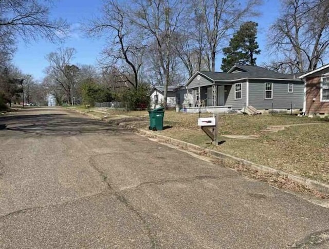 1216 W 6th St, Texarkana, TX 75501 - view of asphalt street featuring curbs