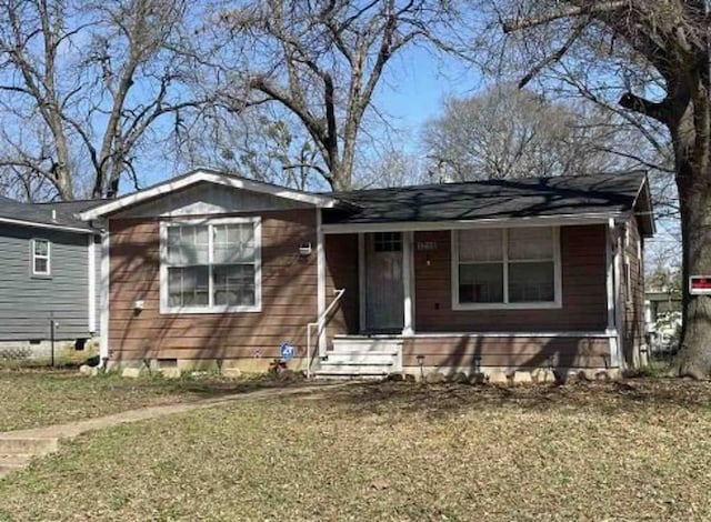 1216 W 6th St, Texarkana, TX 75501 - view of front of property with crawl space, a porch, and a front yard