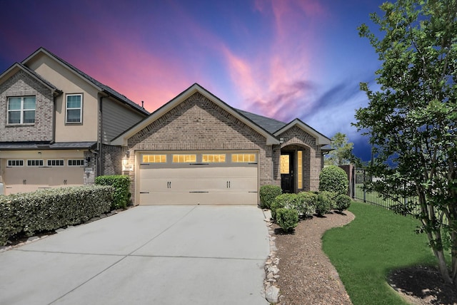 1404 Woods Lake Ct, Houston, TX 77047 - view of front of property featuring driveway, brick siding, and an attached garage
