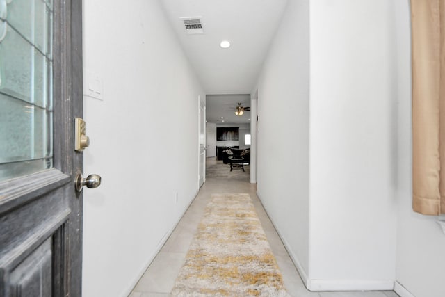 1404 Woods Lake Ct, Houston, TX 77047 - hall featuring recessed lighting and light tile patterned floors