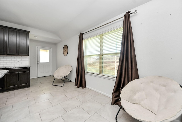 1404 Woods Lake Ct, Houston, TX 77047 - sitting room featuring baseboards and light tile patterned floors