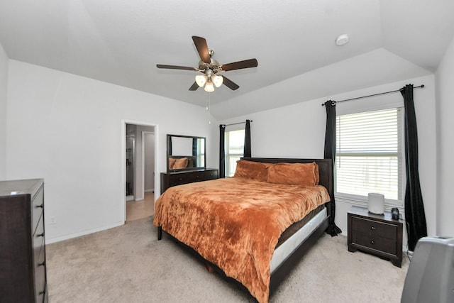 1404 Woods Lake Ct, Houston, TX 77047 - bedroom with light colored carpet, vaulted ceiling, and ceiling fan