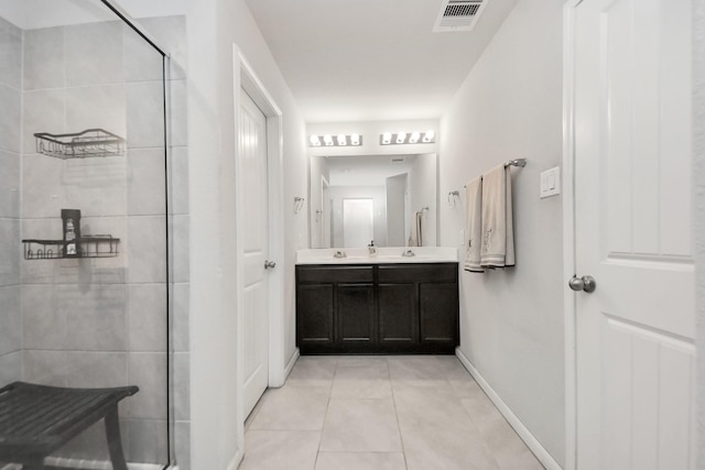 1404 Woods Lake Ct, Houston, TX 77047 - bathroom featuring tile patterned flooring, double vanity, and tiled shower