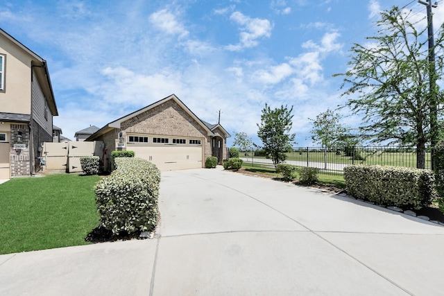 1404 Woods Lake Ct, Houston, TX 77047 - view of home's exterior featuring brick siding, concrete driveway, and an attached garage