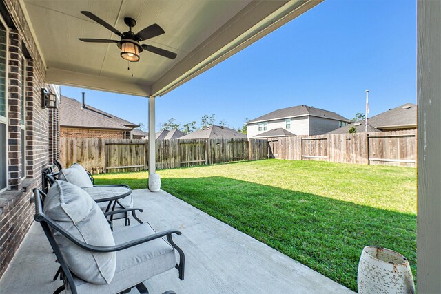 31144 Aspen Gate Trl, Spring, TX 77386 - fenced backyard with a patio area and a ceiling fan