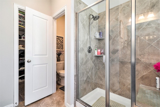 31144 Aspen Gate Trl, Spring, TX 77386 - bathroom featuring a stall shower and a walk in closet