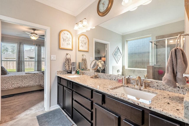 31144 Aspen Gate Trl, Spring, TX 77386 - ensuite bathroom with double vanity, crown molding, a shower stall, ceiling fan, and tile patterned flooring