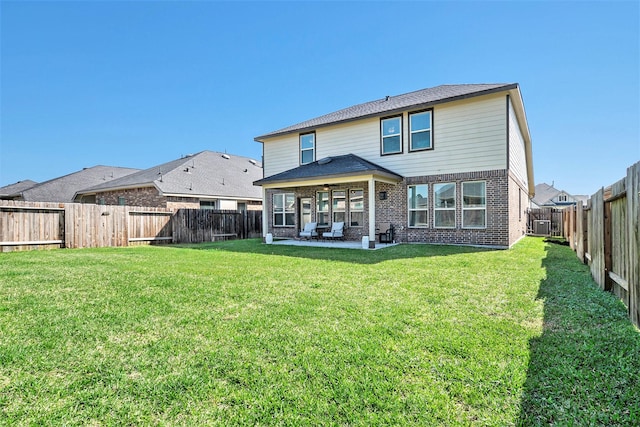 31144 Aspen Gate Trl, Spring, TX 77386 - back of property with a patio, a fenced backyard, brick siding, and ceiling fan