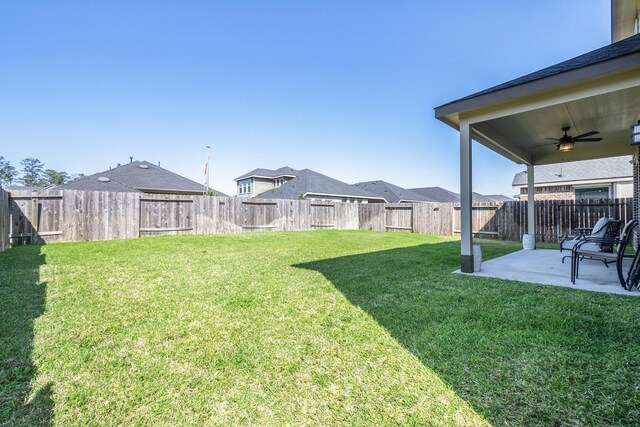 31144 Aspen Gate Trl, Spring, TX 77386 - fenced backyard with a patio area, ceiling fan, and a residential view