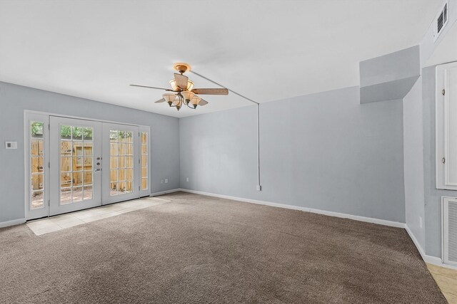 5237 Arboles Dr Unit C, Houston, TX 77035 - spare room featuring light colored carpet, a ceiling fan, and french doors