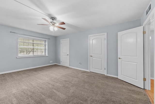 5237 Arboles Dr Unit C, Houston, TX 77035 - unfurnished bedroom with carpet and ceiling fan