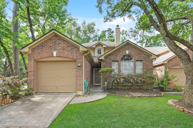 2920 Elm Grove Ct, Kingwood, TX 77339 - view of front facade with brick siding, a chimney, concrete driveway, and an attached garage