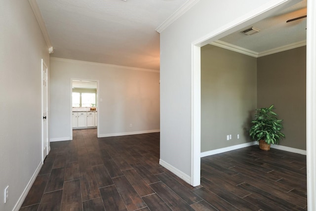 9111 Sutter Ranch Dr, Houston, TX 77064 - corridor with dark wood finished floors and crown molding