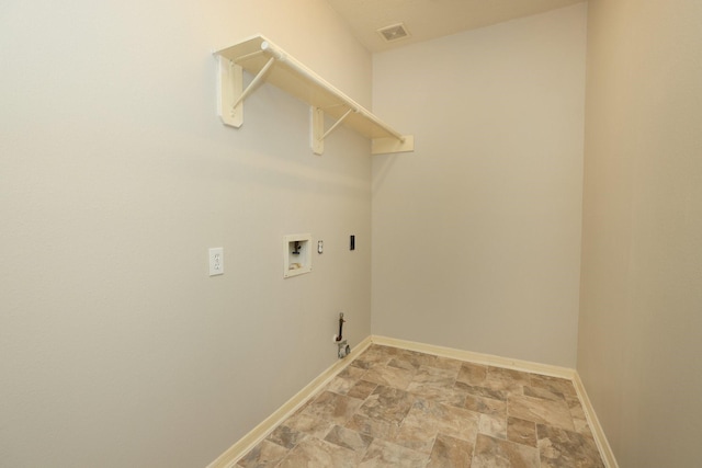 9111 Sutter Ranch Dr, Houston, TX 77064 - washroom with washer hookup, light stone finish flooring, and gas dryer hookup