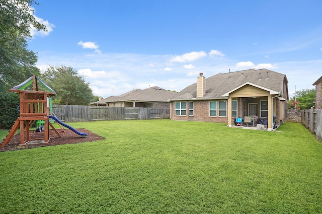 10011 Forrester Trl, Katy, TX 77494 - fenced backyard featuring a playground