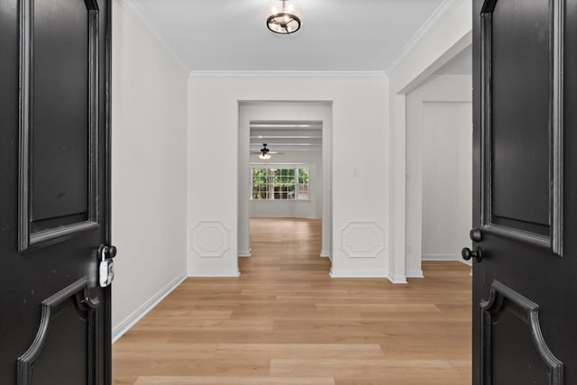 3 Briarwood Dr, Conroe, TX 77301 - entrance foyer featuring light wood-style flooring and ornamental molding