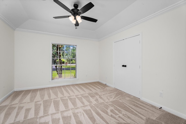 3 Briarwood Dr, Conroe, TX 77301 - carpeted empty room featuring a raised ceiling, ceiling fan, and ornamental molding