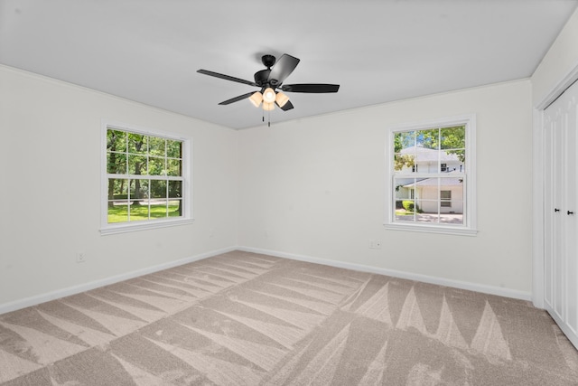 3 Briarwood Dr, Conroe, TX 77301 - carpeted spare room featuring plenty of natural light and a ceiling fan