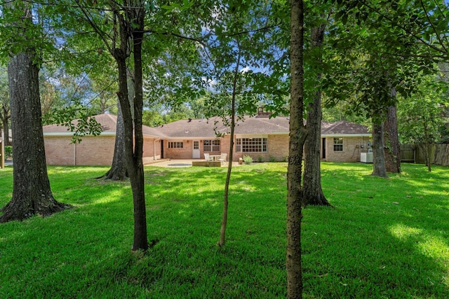 3 Briarwood Dr, Conroe, TX 77301 - view of yard featuring a patio area