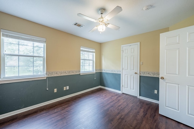 13141 Nicholson Rd, Conroe, TX 77303 - unfurnished bedroom featuring dark wood-style floors and a ceiling fan