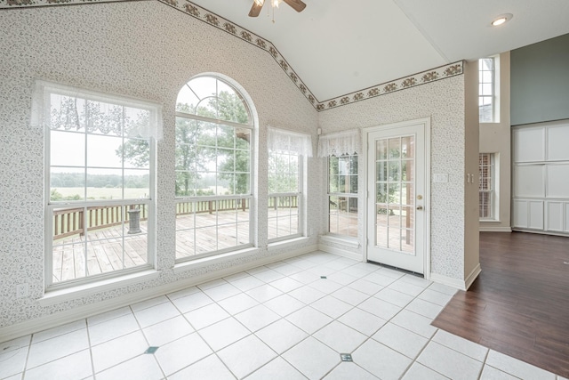 13141 Nicholson Rd, Conroe, TX 77303 - unfurnished sunroom featuring vaulted ceiling
